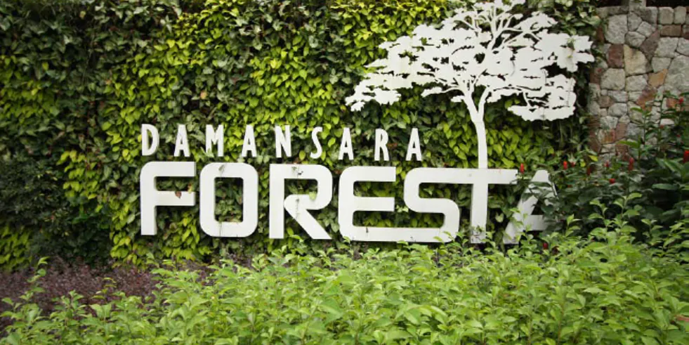 Damansara Foresta sign set into a green wall at the Foresta Sales Gallery